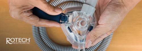 Person's hands assembling a CPAP mask