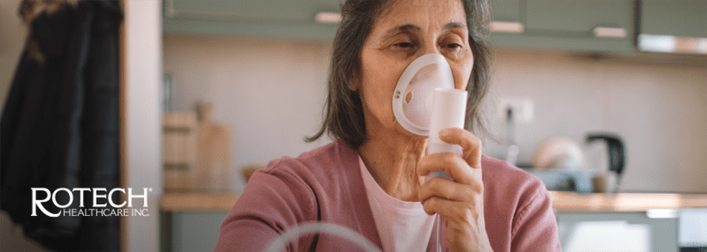 Woman using an oxygen mask in her home