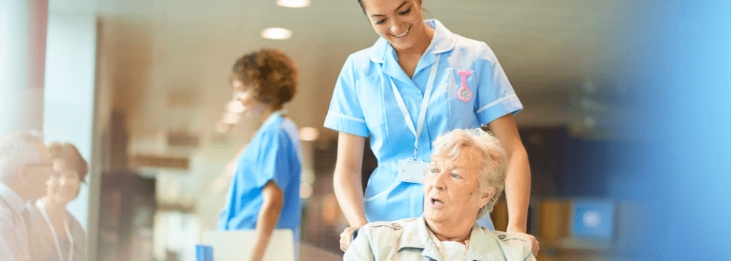 Patient in chair getting discharged from hospital