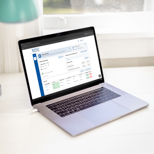 Laptop on a desk displaying the Rotech patient portal dashboard, showing patient information and account details.